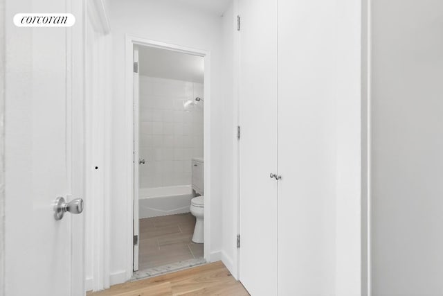 hallway featuring light hardwood / wood-style flooring