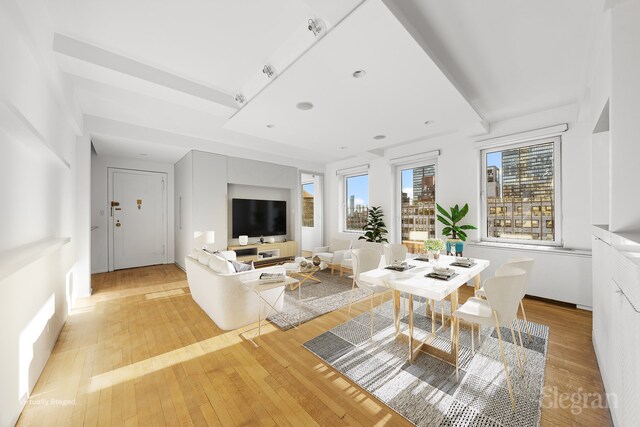 unfurnished living room with light hardwood / wood-style floors