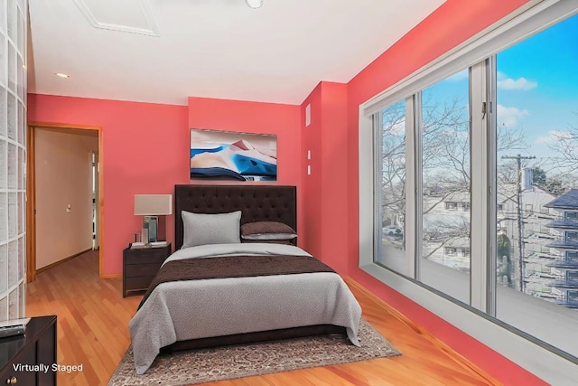 bedroom featuring hardwood / wood-style floors