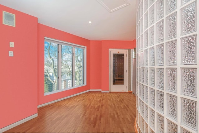 interior space with hardwood / wood-style flooring