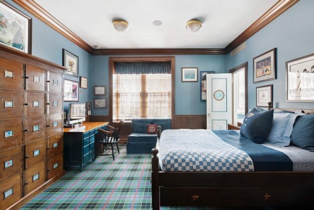 bedroom with ornamental molding