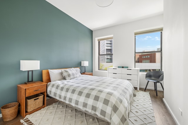 bedroom featuring light wood-type flooring