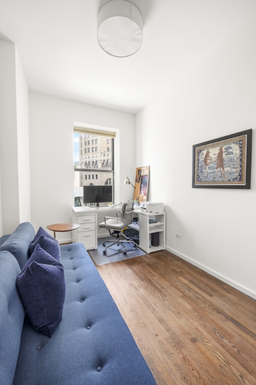 office area with hardwood / wood-style flooring