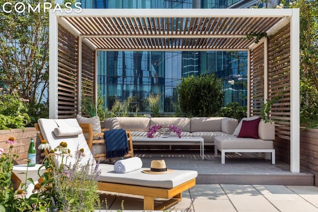 view of patio / terrace featuring an outdoor hangout area and a pergola