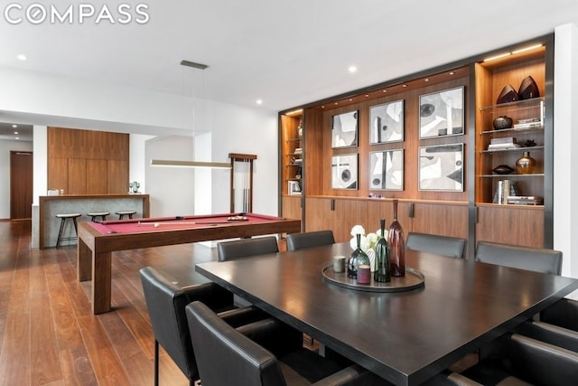 dining space featuring billiards and hardwood / wood-style floors