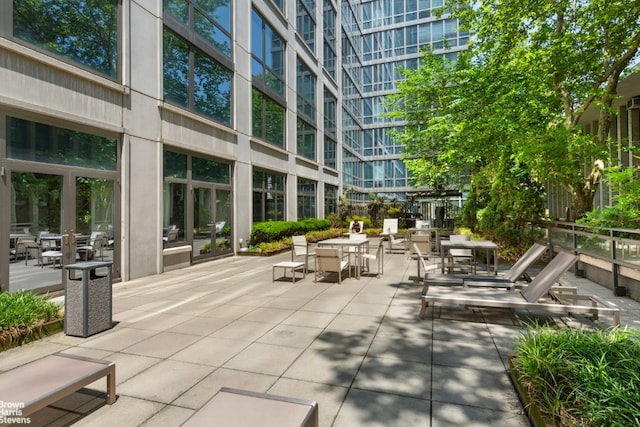 surrounding community featuring a patio