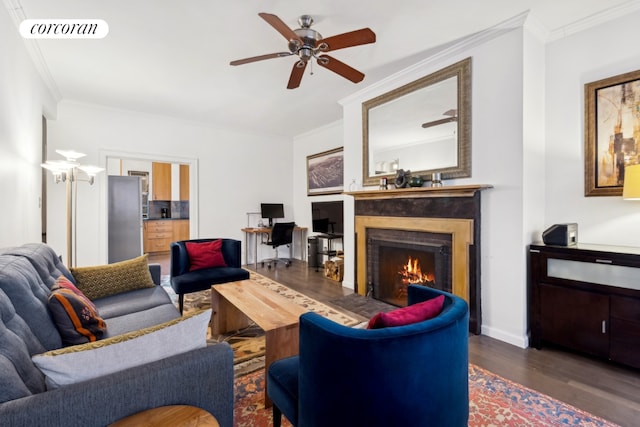 living room featuring dark wood-type flooring, ceiling fan, and ornamental molding