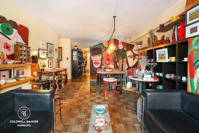 recreation room featuring parquet floors