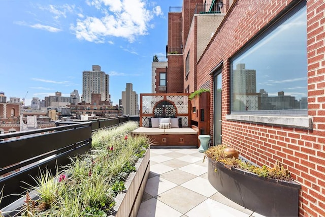 balcony featuring a view of city