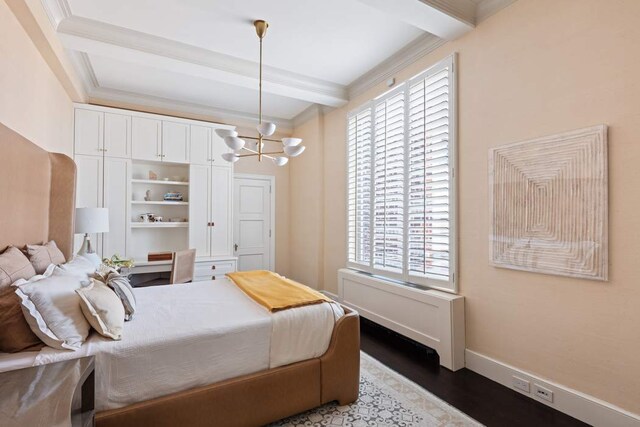 bedroom featuring beamed ceiling, crown molding, dark wood-type flooring, and a chandelier