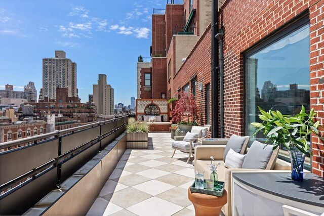 view of patio / terrace with a balcony