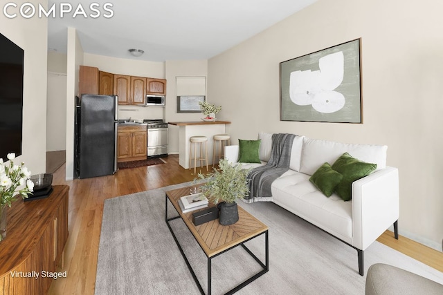 living room featuring light wood-type flooring