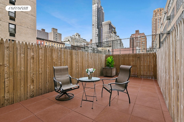 240 E 76th St Unit 1U, New York City, NY 10021 - view of patio with a city view