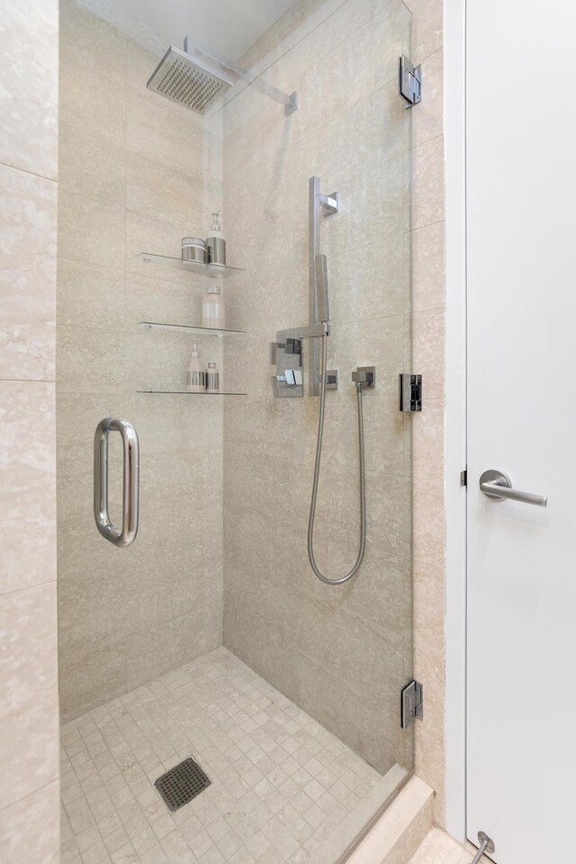 75 Wall St Unit 31P, New York City, NY 10005 - full bathroom with a shower stall