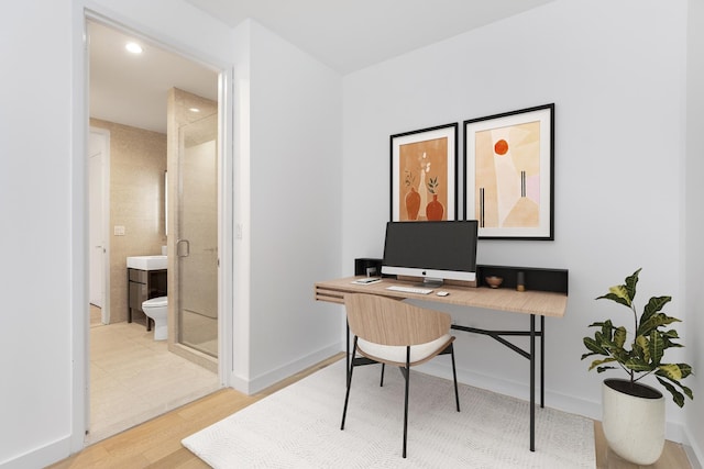 office area featuring wood finished floors, baseboards, and recessed lighting