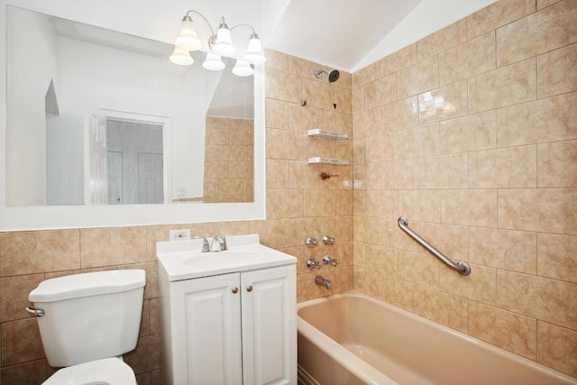 full bathroom with toilet, vanity, tile walls, vaulted ceiling, and tiled shower / bath combo