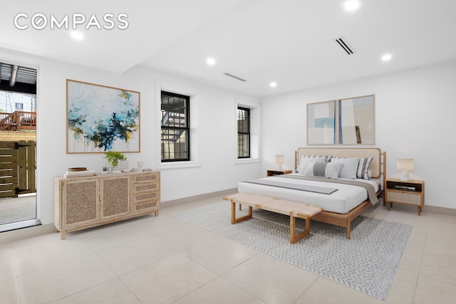 bedroom featuring recessed lighting, light tile patterned floors, and baseboards