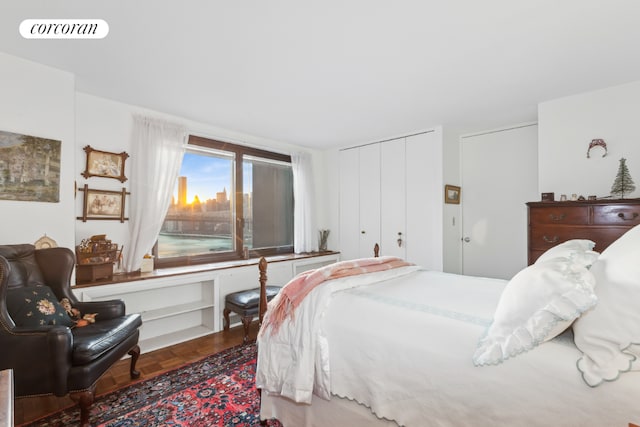 bedroom with a closet and visible vents