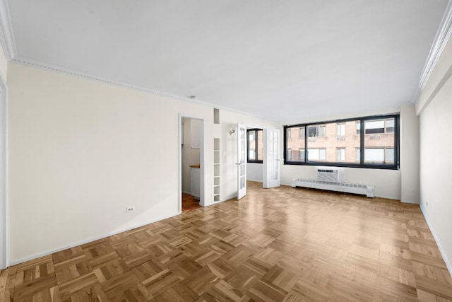 unfurnished living room with parquet floors, radiator heating unit, and ornamental molding