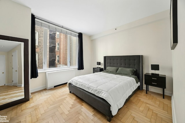 bedroom featuring baseboards