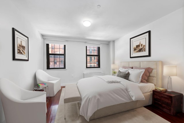 bedroom featuring dark wood-type flooring