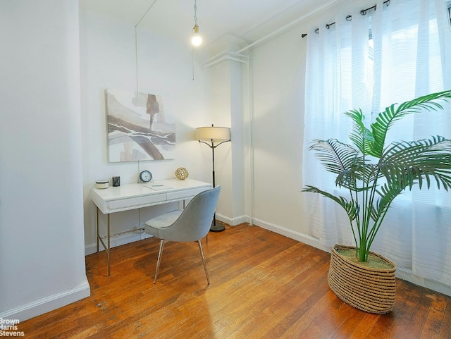 bedroom with dark parquet flooring and ornamental molding