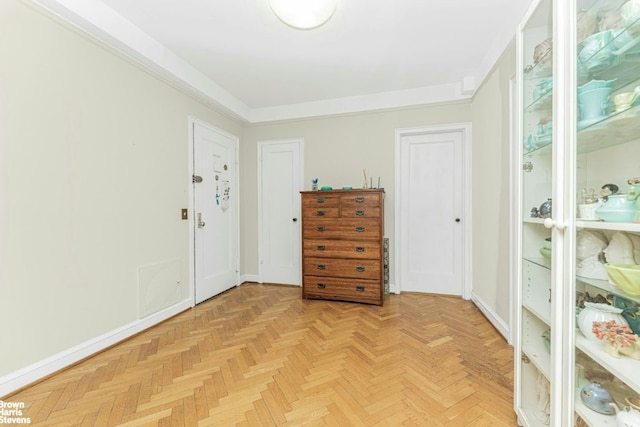 entryway with light parquet flooring