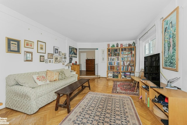 living room with parquet flooring