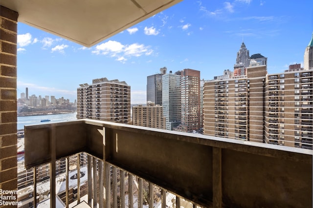 balcony featuring a water view