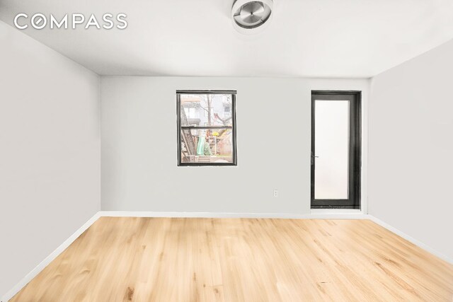 full bathroom featuring toilet, bath / shower combo with glass door, backsplash, and vanity