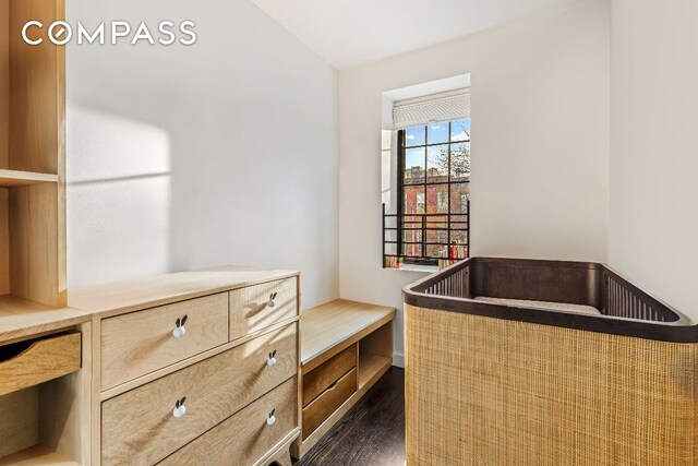 spare room with wood-type flooring