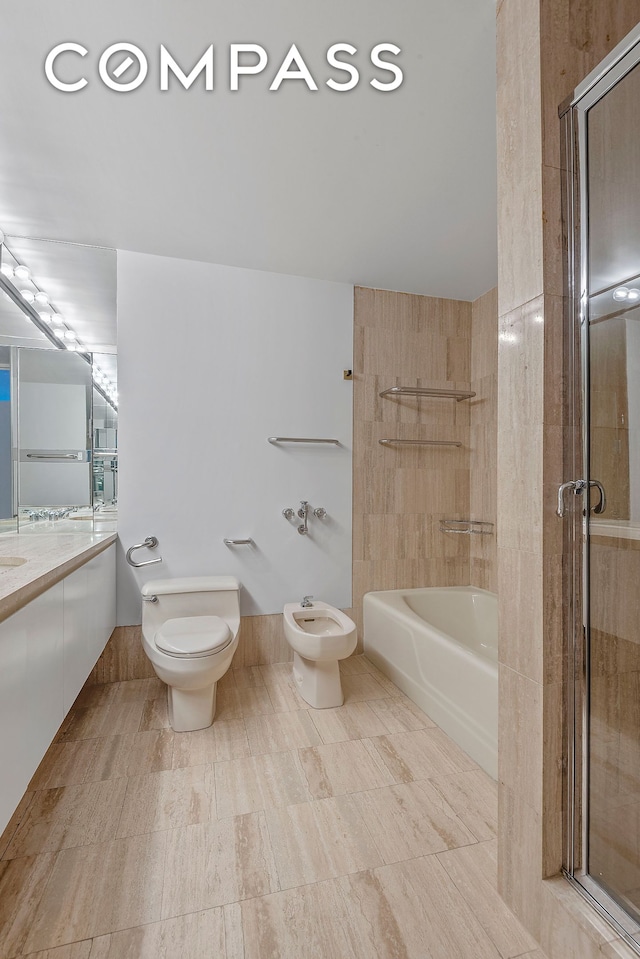 full bathroom featuring a tub to relax in, toilet, a bidet, and a shower with door