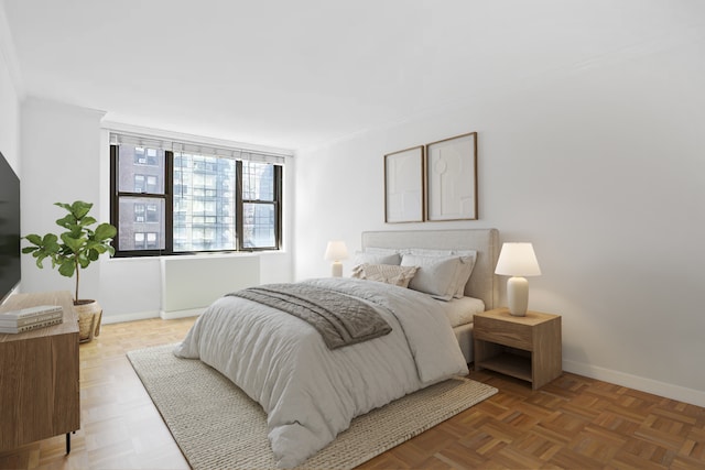 301 E 79th St Unit 5P, New York City, NY 10075 - bedroom featuring baseboards