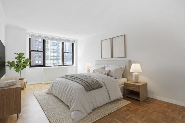 bedroom featuring parquet floors