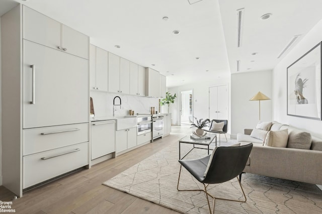 living area featuring light wood-type flooring