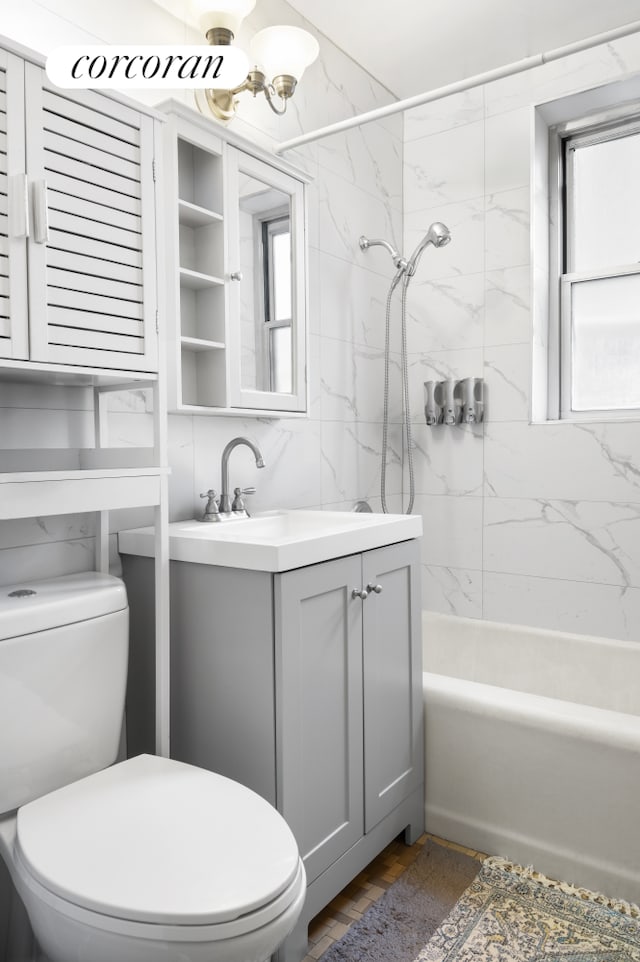 full bathroom featuring tile walls, shower / bath combination, toilet, vanity, and wood finished floors