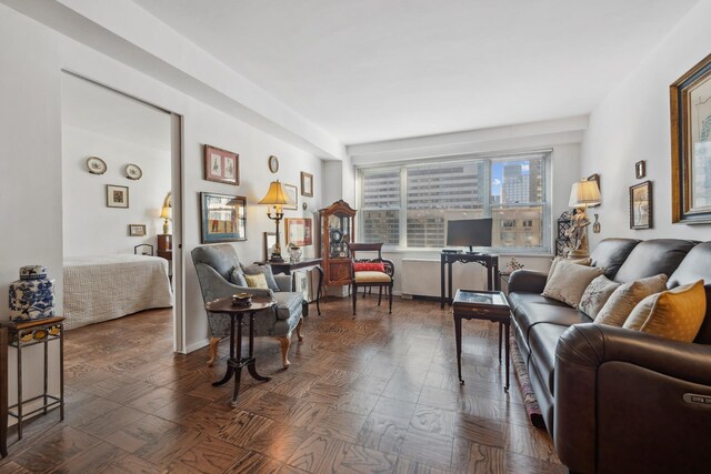 dining area featuring parquet flooring