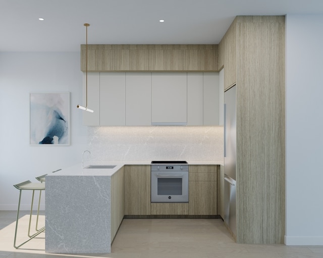 kitchen with white oven, decorative backsplash, decorative light fixtures, light brown cabinetry, and sink