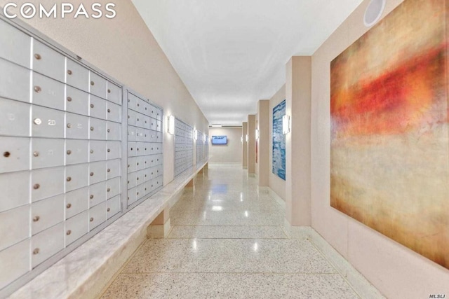 hallway with mail boxes