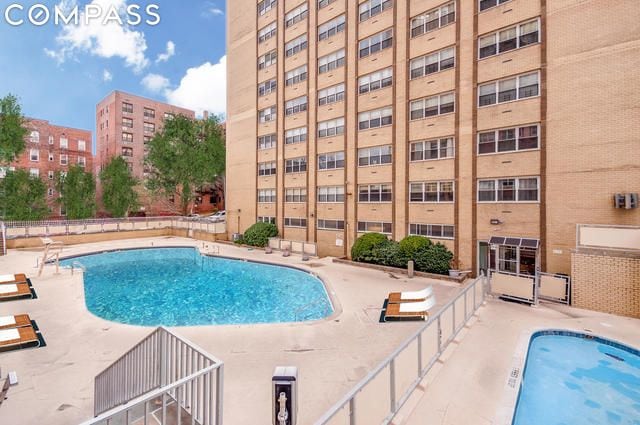 view of swimming pool featuring a patio