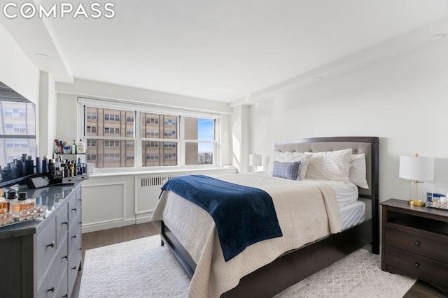 bedroom with light hardwood / wood-style flooring