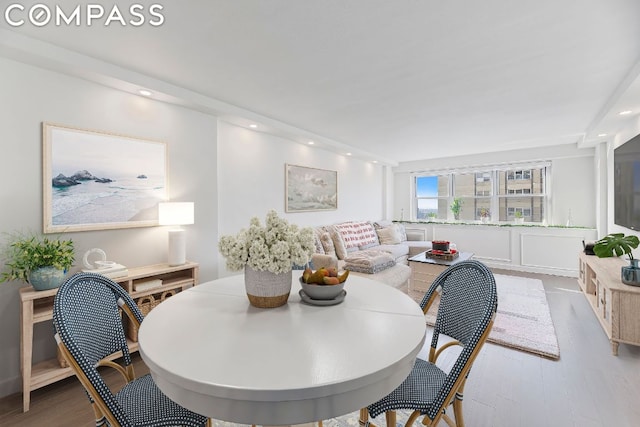 dining room with light hardwood / wood-style floors