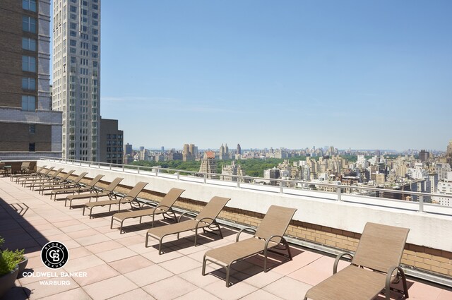 118 E 60th St Unit 28G, New York City, NY 10022 - view of patio / terrace featuring a view of city