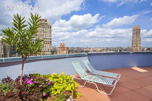 304 E 65th St Unit 38Ad, New York City, NY 10065 - view of patio featuring a view of city and a balcony