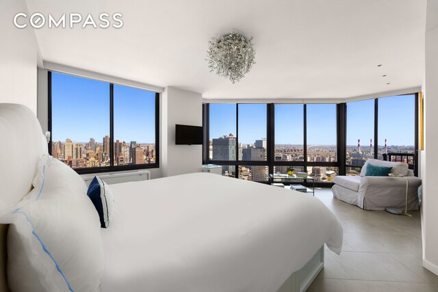 304 E 65th St Unit 38Ad, New York City, NY 10065 - bedroom with light tile patterned floors
