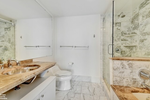 446 Kent Ave Phd, Phd, New York City, NY 11211 - full bath with a stall shower, marble finish flooring, and toilet