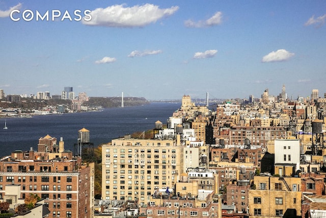 property's view of city with a water view