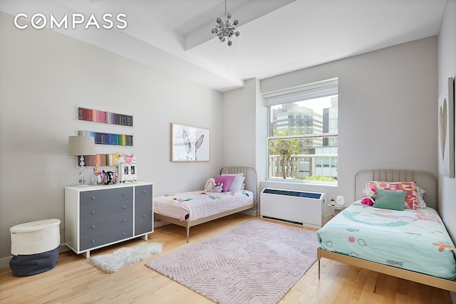 bedroom featuring wood finished floors