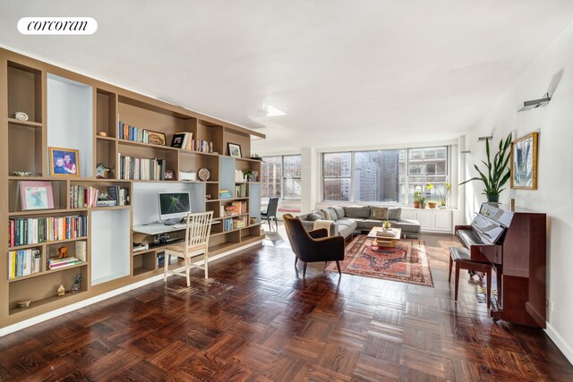 dining space with parquet floors and a wealth of natural light