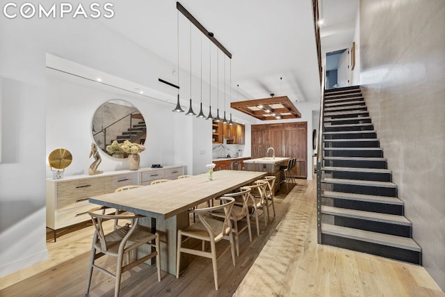 dining area with light hardwood / wood-style flooring